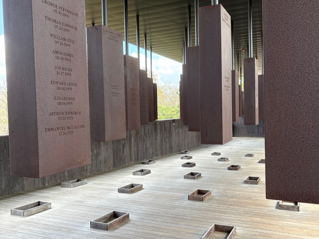 A few steel columns with names inscribed